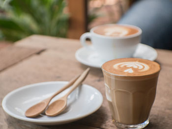 Close-up of cappuccino on table