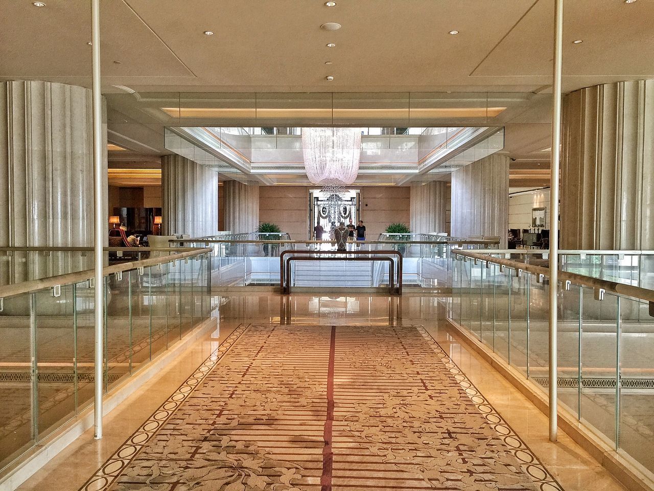 indoors, architecture, built structure, art, art and craft, ceiling, creativity, architectural column, flooring, human representation, corridor, empty, door, the way forward, no people, day, wall - building feature, column, sculpture, absence