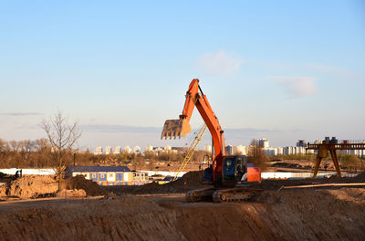 Construction site on field against sky