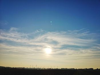 Scenic view of silhouette landscape against sky during sunset