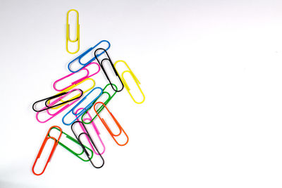  directly above shot of paper clips against white background