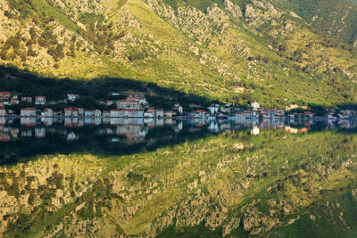 Reflection of rijeka crnojevica and mountains on lake skadar