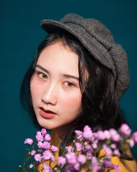 Close-up portrait of beautiful woman with flowers