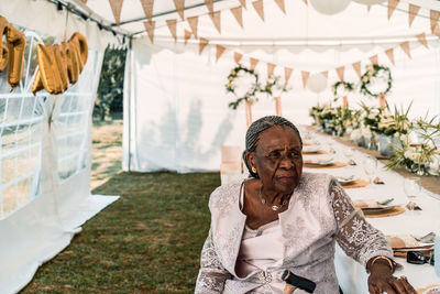 Senior woman sitting at table