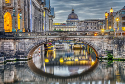 View along the museum island in berlin at dawn with the cupola of the berlin palace in the back