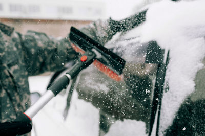 Reflection of person on road in winter
