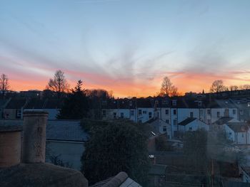 High angle view of townscape against sky at sunset