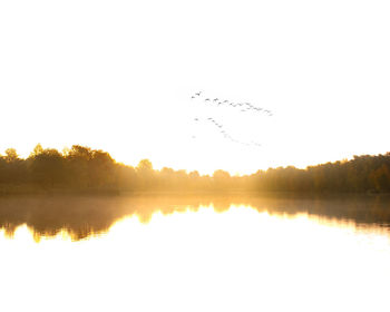 Scenic view of lake against clear sky