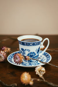 Close-up of tea cup on table