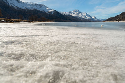 Switzerland, february 21, 2023 panorama with the lake of silvaplana and the mount corvatsch 
