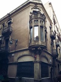 Low angle view of old building against sky