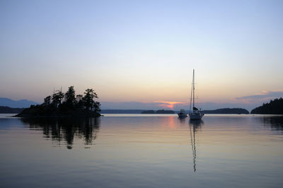 Silhouette of marina at sunset