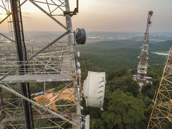 High angle view of communications tower against sky