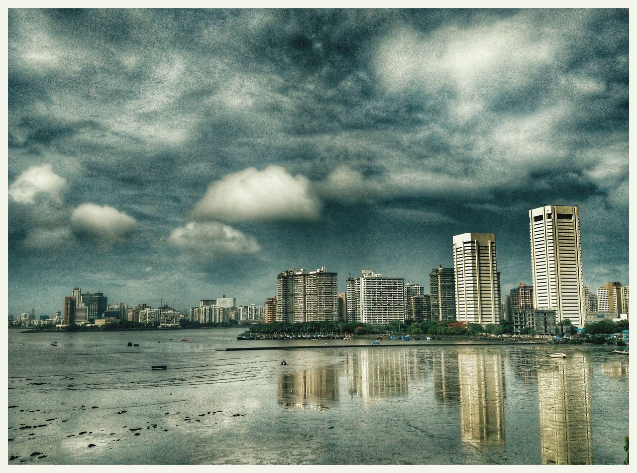 building exterior, architecture, built structure, sky, water, cloud - sky, city, cloudy, waterfront, weather, cityscape, overcast, auto post production filter, residential building, river, sea, cloud, transfer print, building, dusk