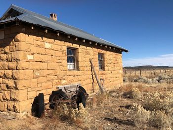 A old abandoned limestone rock homestead in rural new mexico, usa.