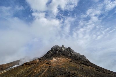 Low angle view of mountain against sky