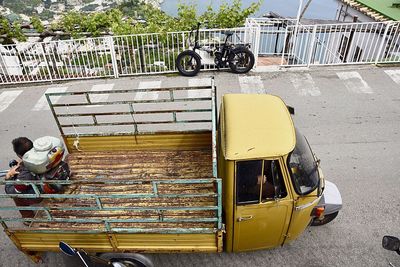 High angle view of man cycling on road