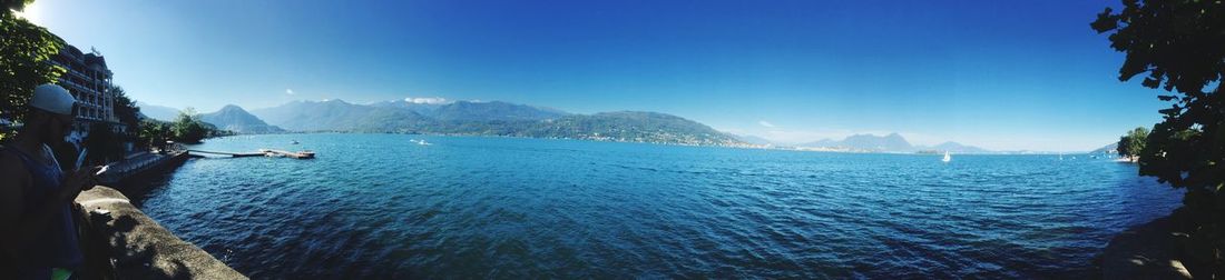 Panoramic view of sea against clear sky