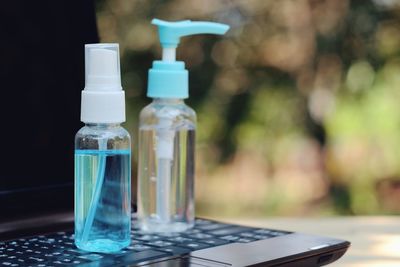 Close-up of water bottle on table