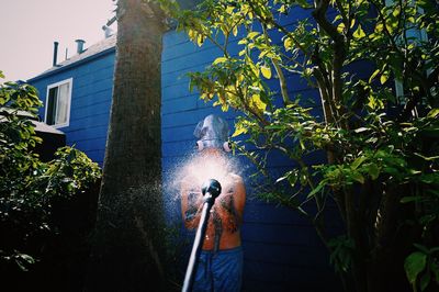 Man spraying water