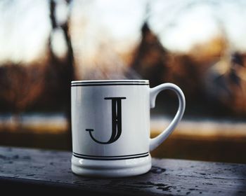 Close-up of coffee cup on table