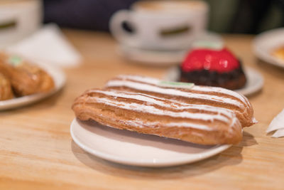 Close-up of baked pastry in plate on table