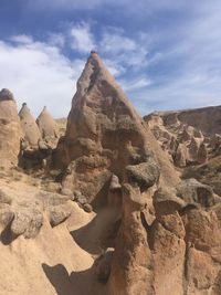 Scenic view of rocky mountains against sky