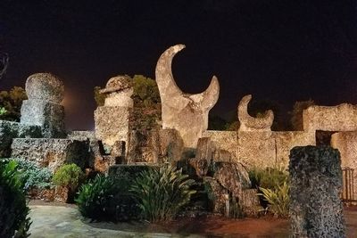 Low angle view of old ruin at night