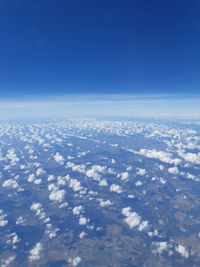 Aerial view of cloudscape against blue sky