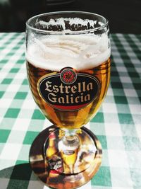 Close-up of beer glass on table