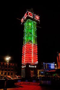 Low angle view of illuminated text at night