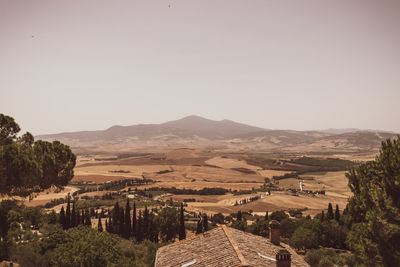 Incredible view of the tuscan countryside during the summer season, from the famous town of pienza.