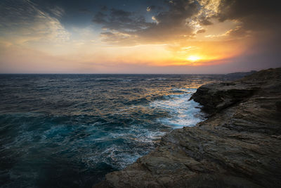 Scenic view of sea against sky during sunset