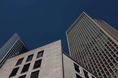 Low angle view of modern building against clear sky