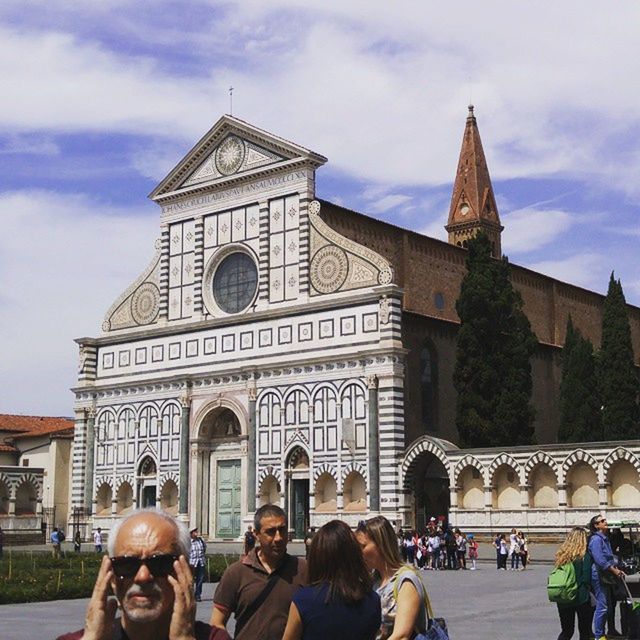 architecture, building exterior, large group of people, built structure, religion, place of worship, sky, spirituality, person, lifestyles, men, church, famous place, tourism, travel destinations, tourist, cloud - sky