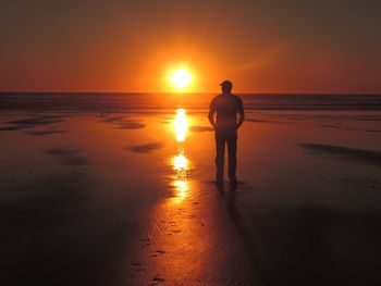 Scenic view of sea at sunset