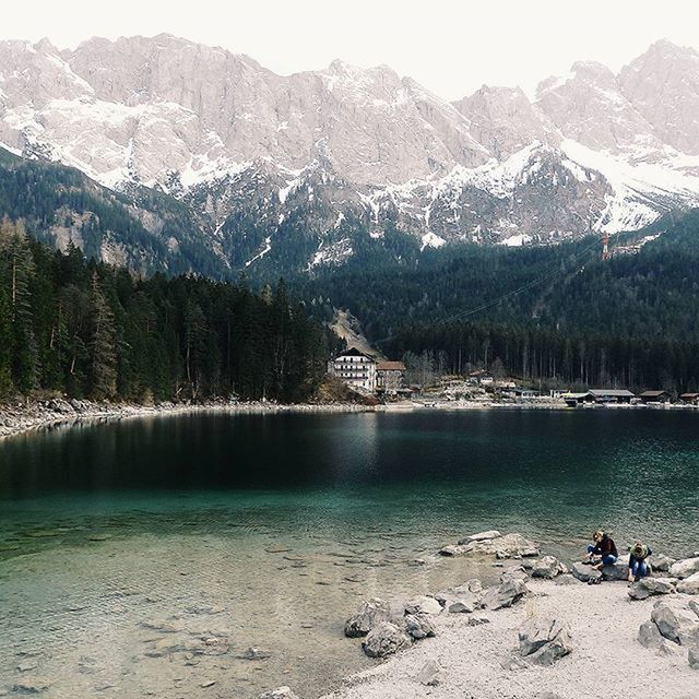 SCENIC VIEW OF LAKE AND MOUNTAINS DURING WINTER