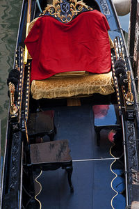 High angle view of people sitting on boat in city