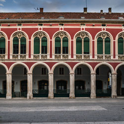 Facade of building against sky in city