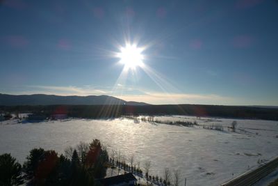 Scenic view of sea against sky during winter