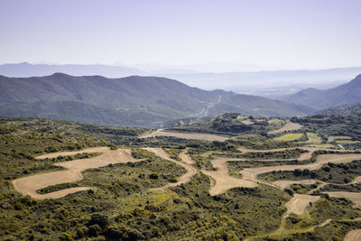 High angle view of agricultural landscape against sky