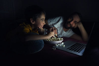 High angle view of people sitting at home