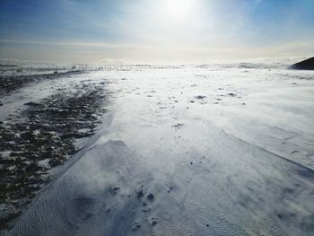 Scenic view of sea against sky during winter