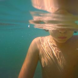 Cropped image of woman in water