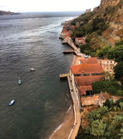 High angle view of town by sea