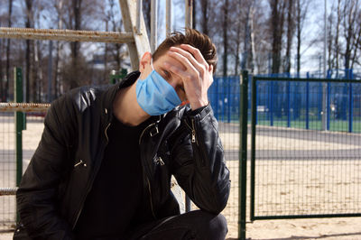 Young man using mobile phone