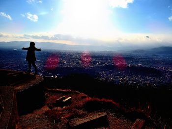 Woman looking at cityscape