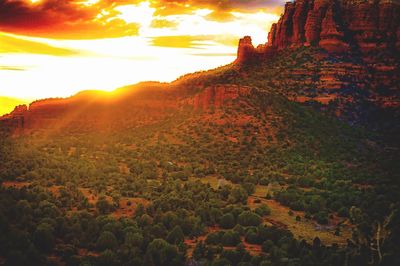 Scenic view of landscape against sky during sunset