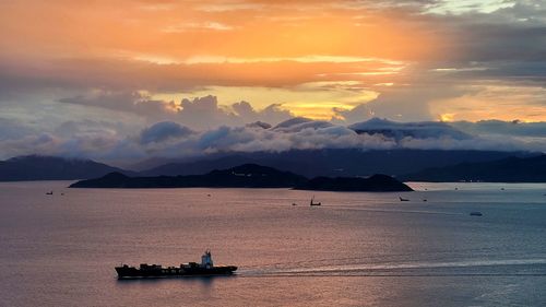 Scenic view of sea against sky during sunset