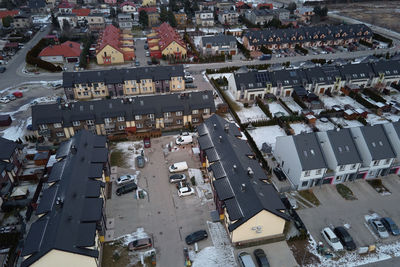 Aerial drone view of residential neighborhood in winter season